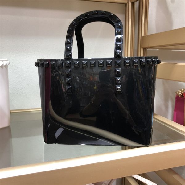 new 2020 rivet pvc shoulder tote bags women candy color women jelly bags purse solid color handbags fashion hand bag sac a main
new 2020 rivet pvc shoulder tote bags women candy color women jelly bags purse solid color handbags fashion hand bag sac a main