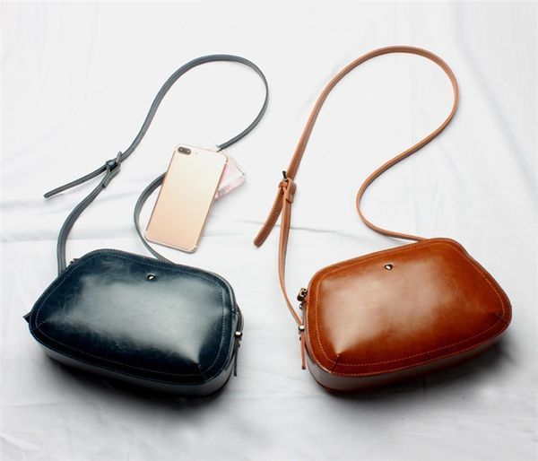 casual fashion brand design female bag new leather simple and versatile fashion shoulder casual handbag ing 
casual fashion brand design female bag new leather simple and versatile fashion shoulder casual handbag ing