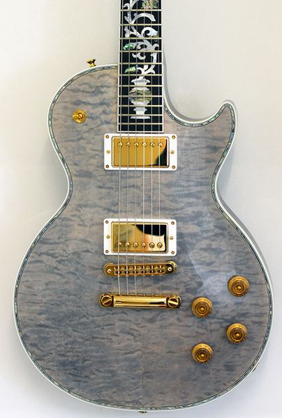 Cu tom ultima gray pearl limited run quilted maple electic guitar abalone body binding tree of life inlay grover imperial tuner
Cu tom ultima gray pearl limited run quilted maple electic guitar abalone body binding tree of life inlay grover imperial tuner