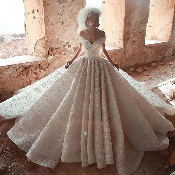 luxurious arabic ball gown wedding dresses off shoulder pearls beaded sweep train bridal gown robe de mariee, White
luxurious arabic ball gown wedding dresses off shoulder pearls beaded sweep train bridal gown robe de mariee, White
