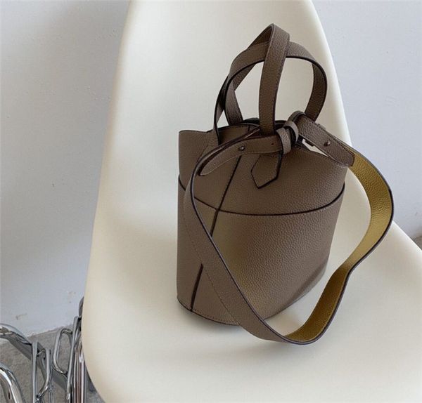 fashionable luxury brand female bag new trend soft face portable solid color casual bucket bag ing
fashionable luxury brand female bag new trend soft face portable solid color casual bucket bag ing