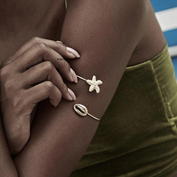 ingesight.z bohemian alloy shell scallop star open cuff arm bangle charm simulated pearl bracelets bangles for women jewelry, Black
ingesight.z bohemian alloy shell scallop star open cuff arm bangle charm simulated pearl bracelets bangles for women jewelry, Black