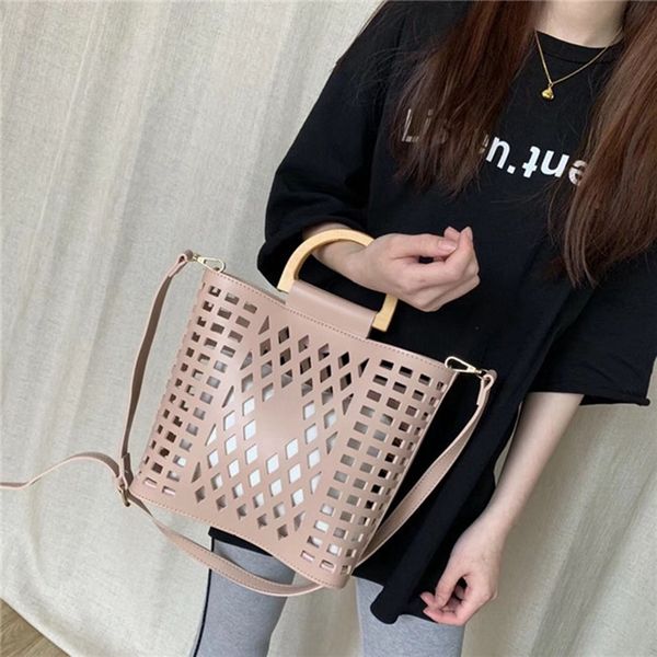 women bags handbags famous brands hollow out beach bag wood handle tote bags pu leather shoulder bag purses
women bags handbags famous brands hollow out beach bag wood handle tote bags pu leather shoulder bag purses