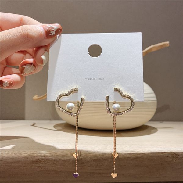 korean fashion sparkly rhinestone heart earrings for women pendients hollow metal simulated pearl long tassel earrings oorbellen, Silver
korean fashion sparkly rhinestone heart earrings for women pendients hollow metal simulated pearl long tassel earrings oorbellen, Silver