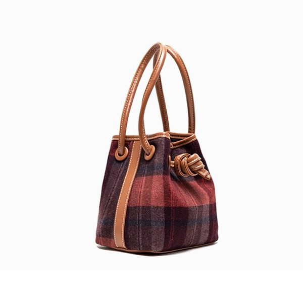 designer handbag autumn and winter design cloth drawstring button bucket bags thousand bird pattern simple lamb hair bag shoulder bags 4
designer handbag autumn and winter design cloth drawstring button bucket bags thousand bird pattern simple lamb hair bag shoulder bags 4