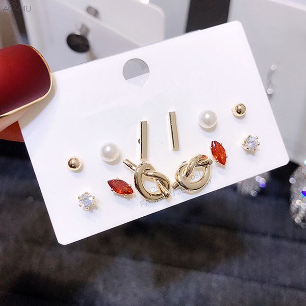 aomu 12pcs/set korean simple mini geometric crystal star heart pearl ball small stud earrings set 2019 for women party jewelry, Golden;silver
aomu 12pcs/set korean simple mini geometric crystal star heart pearl ball small stud earrings set 2019 for women party jewelry, Golden;silver