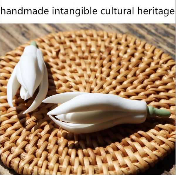 a pair of ceramic magnolia flower creative tea ceremony tea mat decorative accessories pen stand shandmade intangible cultural heritage
a pair of ceramic magnolia flower creative tea ceremony tea mat decorative accessories pen stand shandmade intangible cultural heritage