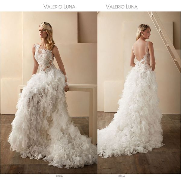 beautiful valerio luna a line wedding dresses jewel sleeveless backless lace applique ruffles wedding gowns sweep train robe de mariée, White
beautiful valerio luna a line wedding dresses jewel sleeveless backless lace applique ruffles wedding gowns sweep train robe de mariée, White