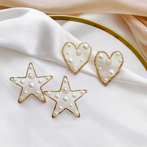yang chenglin earrings female 925 silver east gate personalized love five-star transparent pearl eardrop, Golden
yang chenglin earrings female 925 silver east gate personalized love five-star transparent pearl eardrop, Golden