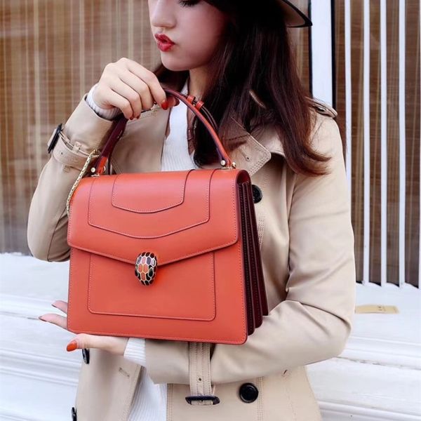 hit color organ enamel snake package genuine leather woman package single shoulder messenger portable small square package
hit color organ enamel snake package genuine leather woman package single shoulder messenger portable small square package