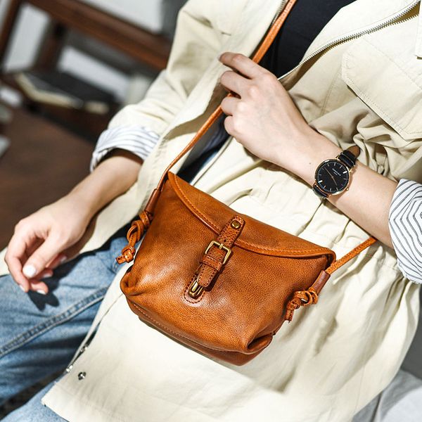hand rub color to do old literature and art retro wild leather small bag texture mini messenger female bag
hand rub color to do old literature and art retro wild leather small bag texture mini messenger female bag