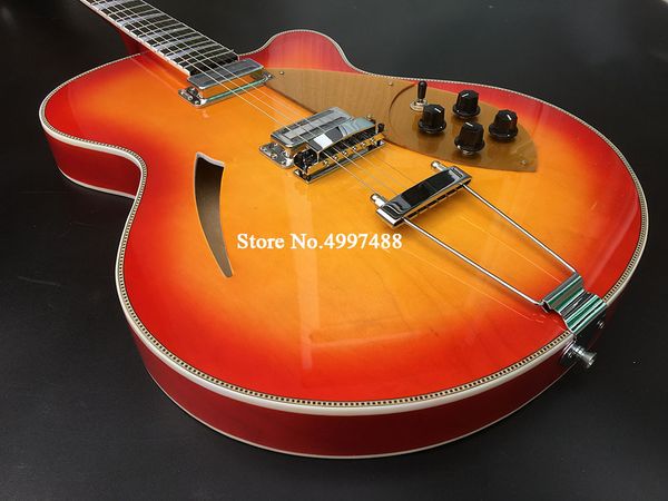 ric 330 370 6 strings cherry sunburst semi hollow body electric guitar single f hole, checkerboard binding, 2 output jacks, gold pickguard
ric 330 370 6 strings cherry sunburst semi hollow body electric guitar single f hole, checkerboard binding, 2 output jacks, gold pickguard