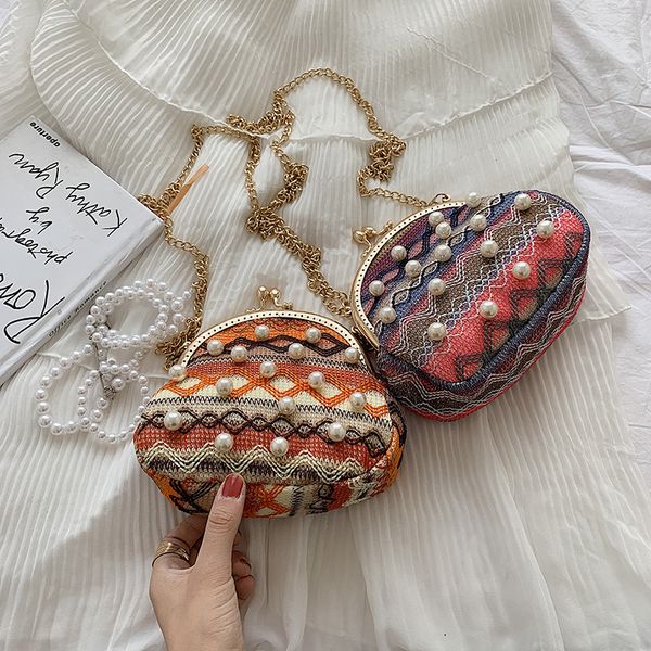 female bag 2019 new straw pearl shell bag national contrast color patchwork frame chain hasp shoulder messenger
female bag 2019 new straw pearl shell bag national contrast color patchwork frame chain hasp shoulder messenger