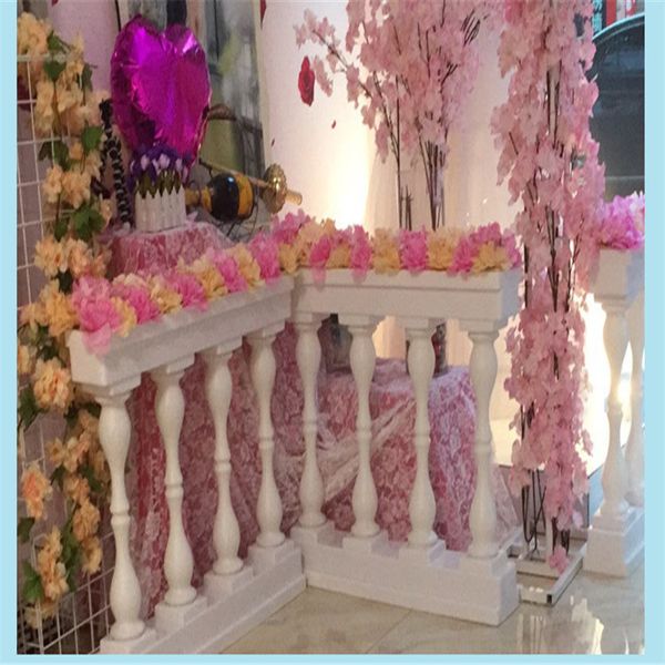 white gold plastic roman column fence road guide props artificial flower stand vase with flower arrangement for wedding backdrop
white gold plastic roman column fence road guide props artificial flower stand vase with flower arrangement for wedding backdrop