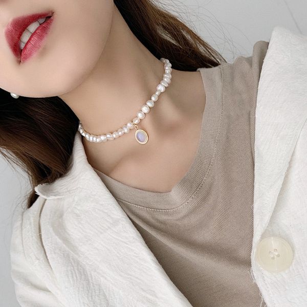 irregular shaped pearl moonlight stone pendant necklace female 925 pure silver short neck chain choker korean version
irregular shaped pearl moonlight stone pendant necklace female 925 pure silver short neck chain choker korean version