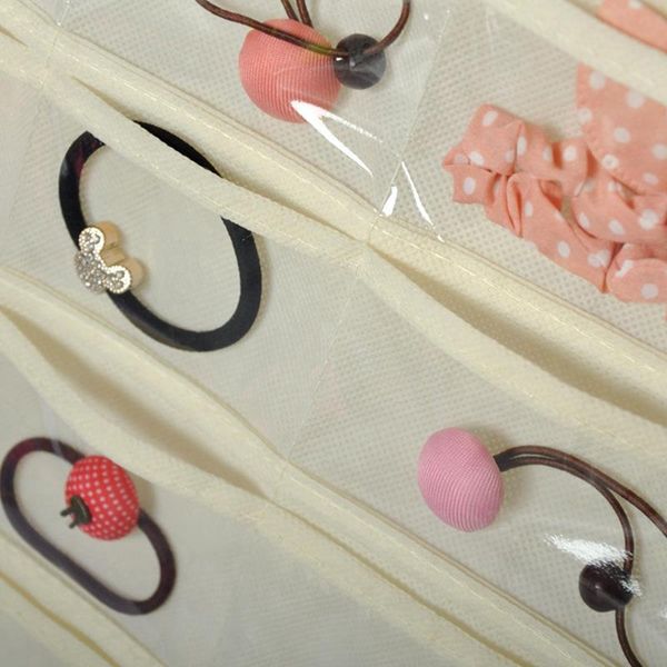 80 grids jewellery hanging bags double-sided small items household storage bag foldable for wardrobe dressing room
80 grids jewellery hanging bags double-sided small items household storage bag foldable for wardrobe dressing room
