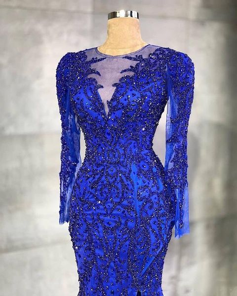 2020 arabic aso ebi royal blue evening dresses luxurious beaded crystals long sleeve sheer neck mermaid style plus formal prom party gowns, Black
2020 arabic aso ebi royal blue evening dresses luxurious beaded crystals long sleeve sheer neck mermaid style plus formal prom party gowns, Black