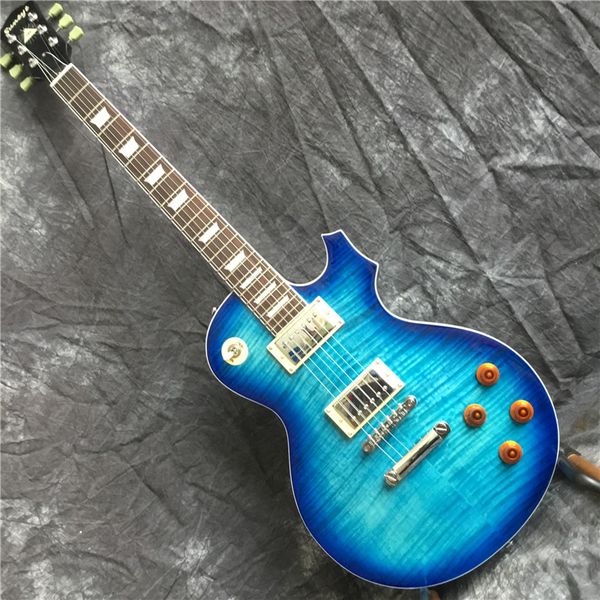 lp electric guitar, solid mahogany body with blue flame maple chrome plated hardware
lp electric guitar, solid mahogany body with blue flame maple chrome plated hardware