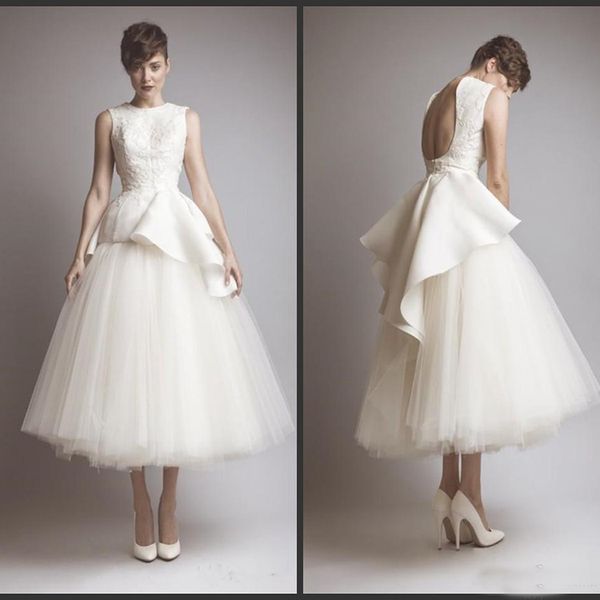 New Stunning A-Line Wedding Dresses Backless Jewel Neck Tea Length Applique Bridal Gowns Tea Length Informal Party Gowns
New Stunning A-Line Wedding Dresses Backless Jewel Neck Tea Length Applique Bridal Gowns Tea Length Informal Party Gowns