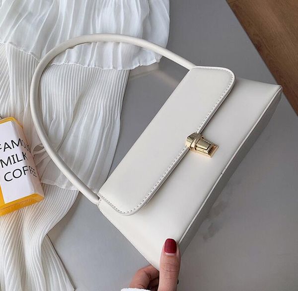 the est brand recommended ladies solid color handbags designer's latest fashion underarm bag high-end locks office workers tote bag
the est brand recommended ladies solid color handbags designer's latest fashion underarm bag high-end locks office workers tote bag