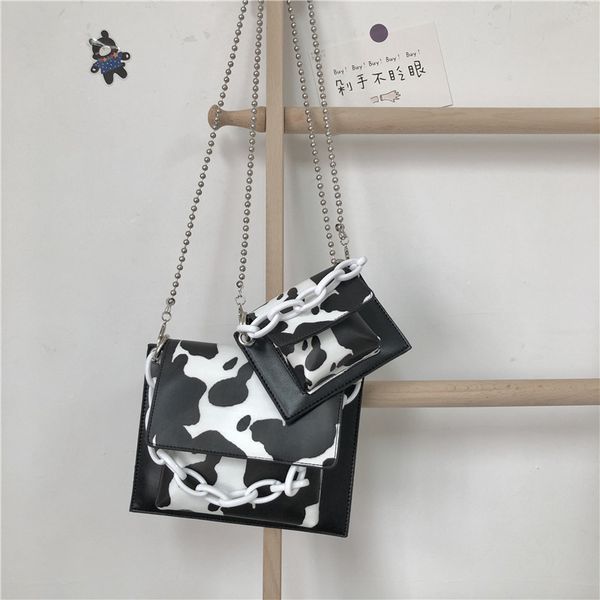 cow print women shoulder bags acrylic chain women handbags mini small ladies hand bags luxury pu leather females totes flap 2020
cow print women shoulder bags acrylic chain women handbags mini small ladies hand bags luxury pu leather females totes flap 2020