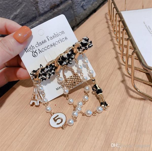 korean fashion brooch original design woolen cartoon iron tower pearl chain 5 word pin buckle badge brooch, Gray
korean fashion brooch original design woolen cartoon iron tower pearl chain 5 word pin buckle badge brooch, Gray