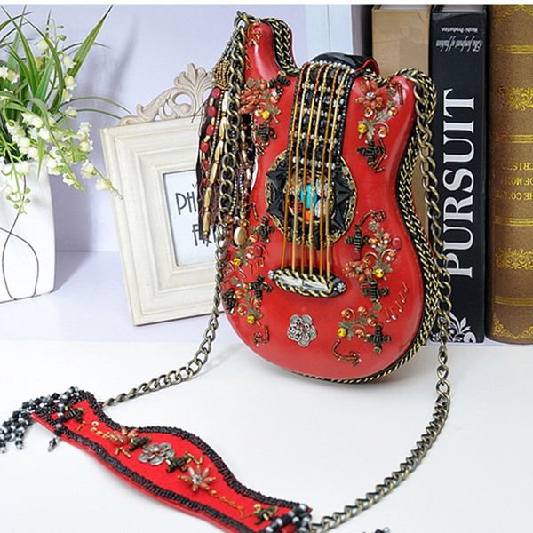 new handmade female bag guitar modeling bag 2020 retro casual handmade beaded chain small shoulder diagonal
new handmade female bag guitar modeling bag 2020 retro casual handmade beaded chain small shoulder diagonal