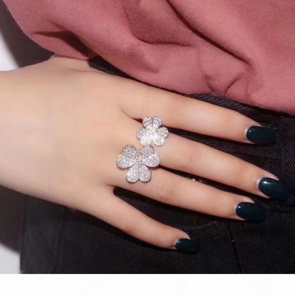 sljely 925 sterling silver full micro cubic zirconia 3 gold color three leaves flower open ring for women luxury jewelry
sljely 925 sterling silver full micro cubic zirconia 3 gold color three leaves flower open ring for women luxury jewelry