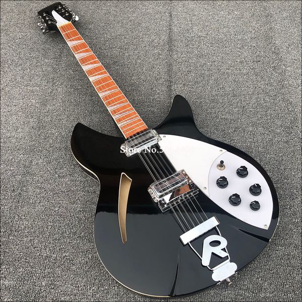 ric 330 12 strings gloss black semi hollow body electric guitar gloss varnish rosewood fingerboard, 2 toaster pickups, two output jacks
ric 330 12 strings gloss black semi hollow body electric guitar gloss varnish rosewood fingerboard, 2 toaster pickups, two output jacks