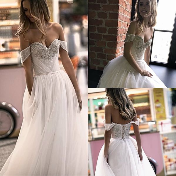 a-line wedding dresses sweetheart sleeveless sequins appliqued lace bridal gown sweep train backless custom made beach robes de mariée, White
a-line wedding dresses sweetheart sleeveless sequins appliqued lace bridal gown sweep train backless custom made beach robes de mariée, White