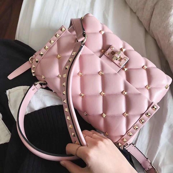 Genuine leather houlder bag rivet bag portable photographic bag color tone houlder trap ilver burgundy pink love key chain
Genuine leather houlder bag rivet bag portable photographic bag color tone houlder trap ilver burgundy pink love key chain