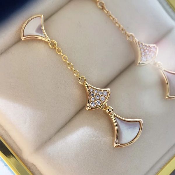 fashion- designer fan earrings natural white mother-of-pearl diamond s925 sterling silver plated 18k gold prom wedding ear studs
fashion- designer fan earrings natural white mother-of-pearl diamond s925 sterling silver plated 18k gold prom wedding ear studs
