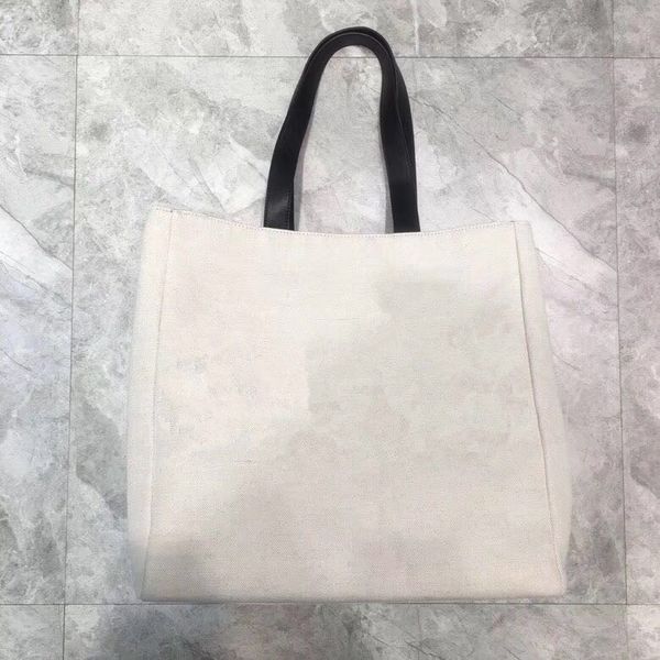 2018 new women's canvas tote. letter printed leather lining d-splicing shoulder bag. fashion trend large-capacity shopping bags 
2018 new women's canvas tote. letter printed leather lining d-splicing shoulder bag. fashion trend large-capacity shopping bags