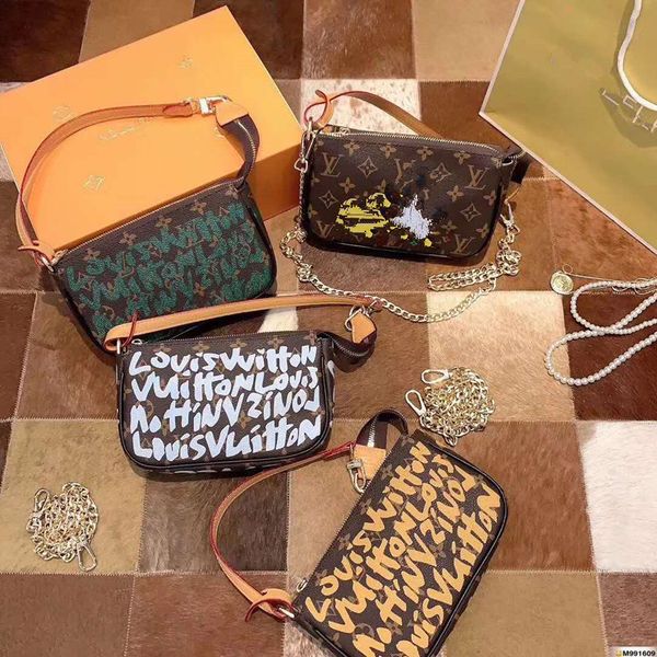 the new 2020 middle graffiti mahjong bag hand the bill of lading shoulder bags underarm genuine leather handbag designer tote
the new 2020 middle graffiti mahjong bag hand the bill of lading shoulder bags underarm genuine leather handbag designer tote