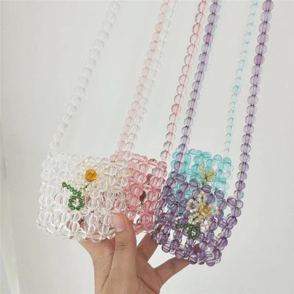 pearl evening bag women luxury hand woven bead clutch purses flower handbag ladies mini cross body bag
pearl evening bag women luxury hand woven bead clutch purses flower handbag ladies mini cross body bag