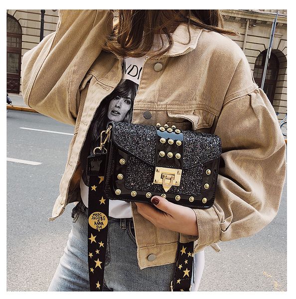 new fashion lacquer lady bag rivet sequins small square lock buckle wide shoulder strap single shoulder inclined bag
new fashion lacquer lady bag rivet sequins small square lock buckle wide shoulder strap single shoulder inclined bag
