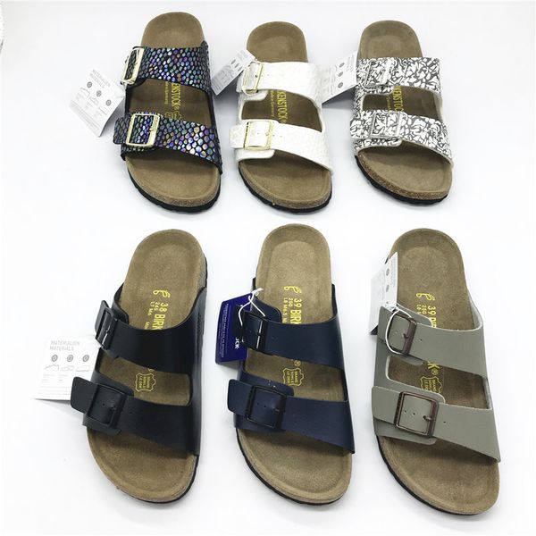 Дизайнерская Обувь Люксовый Бренд Тапочки Унисекс Пу Аризона Сандалии Два Ремня Пробкового Дна Тапочки 8 Цветов Сабо для Пляжного Отдыха
Дизайнерская Обувь Люксовый Бренд Тапочки Унисекс Пу Аризона Сандалии Два Ремня Пробкового Дна Тапочки 8 Цветов Сабо для Пляжного Отдыха