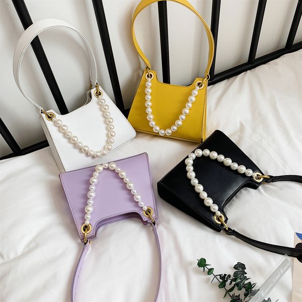 solid mini pearl handbags 2020 summer fashion pu leather shoulder bags for women female casual brief lady versatile axillary bag
solid mini pearl handbags 2020 summer fashion pu leather shoulder bags for women female casual brief lady versatile axillary bag