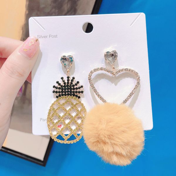 autumn and winter new personality sweet rhinestones love pineapple hairball asymmetry silver needle earrings female jewelry
autumn and winter new personality sweet rhinestones love pineapple hairball asymmetry silver needle earrings female jewelry