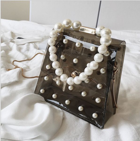 wholesales summer female small bag female 2019 new handbag girl pearl hand bag transparent jelly shoulder messenger chain bag
wholesales summer female small bag female 2019 new handbag girl pearl hand bag transparent jelly shoulder messenger chain bag