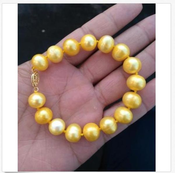 14k gold clasp huge 7.5"-8" 11-12mm genuine south sea golden pearl bracelet, Black
14k gold clasp huge 7.5"-8" 11-12mm genuine south sea golden pearl bracelet, Black