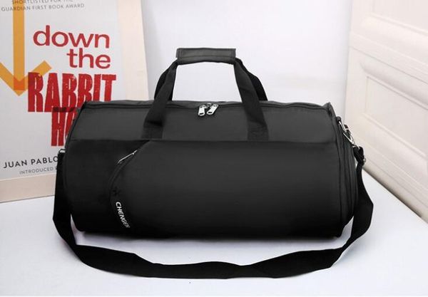 waterproof gym bag fitness training sports bag portable shoulder travel bag independent shoes storage sac de sport 
waterproof gym bag fitness training sports bag portable shoulder travel bag independent shoes storage sac de sport