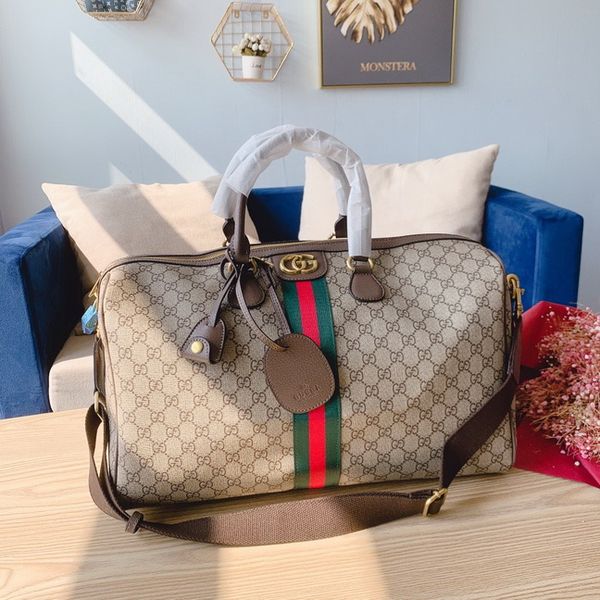 2019 new fashion men women travel bag duffle bag designers luggage luxury handbags large capacity crossbody sport bag delivery
2019 new fashion men women travel bag duffle bag designers luggage luxury handbags large capacity crossbody sport bag delivery