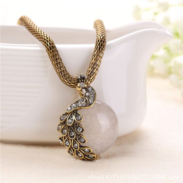bohemian peacock pendant necklaces gold color metal long chain white crystal stone statement necklaces for women, Silver
bohemian peacock pendant necklaces gold color metal long chain white crystal stone statement necklaces for women, Silver