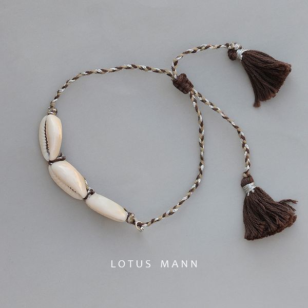 lotus mann my secret with the sea three shells weave small tassel bracelet, Golden;silver
lotus mann my secret with the sea three shells weave small tassel bracelet, Golden;silver