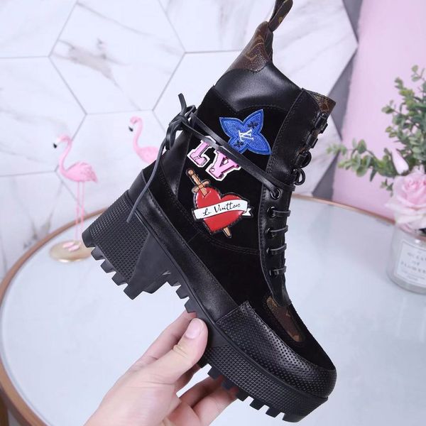 autumn and winter new patent leather martin boots female british wind thick bottom muffin bottom hit color bright leather high shoes
autumn and winter new patent leather martin boots female british wind thick bottom muffin bottom hit color bright leather high shoes