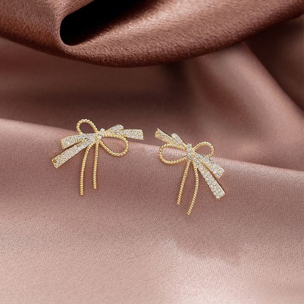 s925 silver needle bow knot full of drilled zircon earrings girl's light luxury exquisite korean versatile earrings
s925 silver needle bow knot full of drilled zircon earrings girl's light luxury exquisite korean versatile earrings