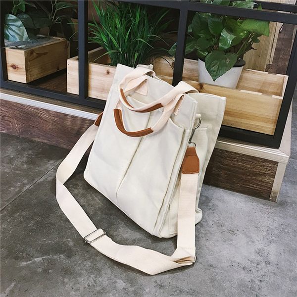 women travel tote crossbody bag solid color foldable handbag female canvas portable big shopping shoulder bag bolso mujer
women travel tote crossbody bag solid color foldable handbag female canvas portable big shopping shoulder bag bolso mujer