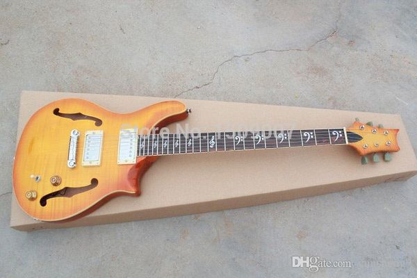 yellow custom 24 figured maple , f hole, maple neck guitar
yellow custom 24 figured maple , f hole, maple neck guitar