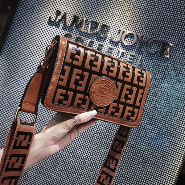Vintage Small Shoulder Bag Женский Новая мода Европейский стиль текстуры сумки на ремне Все Matching Broadband Сумка
Vintage Small Shoulder Bag Женский Новая мода Европейский стиль текстуры сумки на ремне Все Matching Broadband Сумка